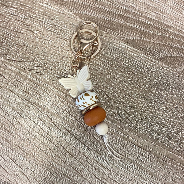 Keyring - Beige Butterfly with Brown Cow Print Bead