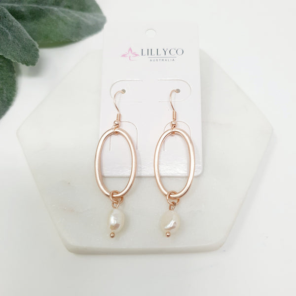 MATTE OVAL SHAPED EARRING